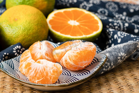 橘子白天丑橘室内水果摄影图配图