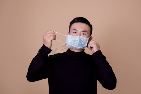 生病感冒防疫戴口罩的男人病毒摄影图配图