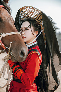 武侠人物摄影照片_武侠白天女侠户外牵着马摄影图配图