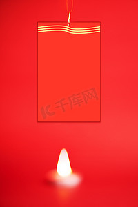 过年春节红色蜡烛喜庆背景点燃的烛光摄影图配图