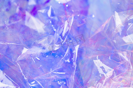 酸性摄影照片_紫色白天糖果纸室内幻彩摄影图配图