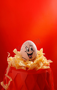 立蛋春分土鸡蛋红色背景创意摄影图配图