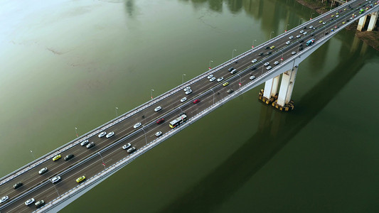 航拍城市大桥上密集行驶的车流交通