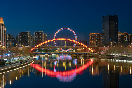 天津海河天津之眼摩天轮夜景摄影图配图