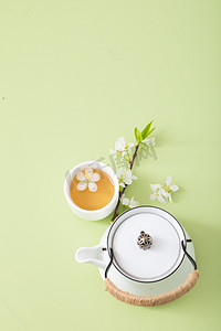 清新海报摄影照片_茶白天茶杯和茶壶室内无摄影图配图
