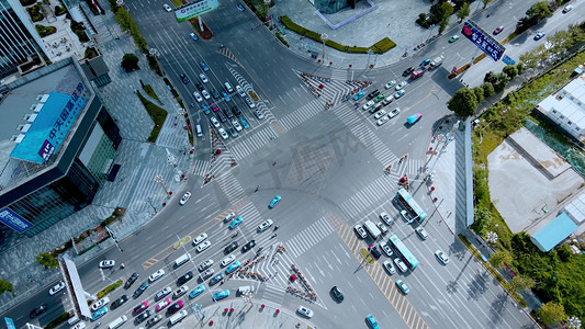 十字路口摄影照片_航拍城区十字路口城市道路车流行驶