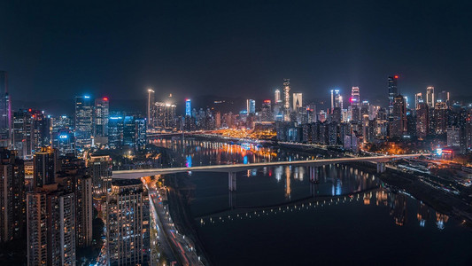重庆城市宣传摄影照片_重庆嘉陵江两岸城市CBD夜景车流