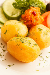 拍黄瓜摄影照片_煮熟的土豆