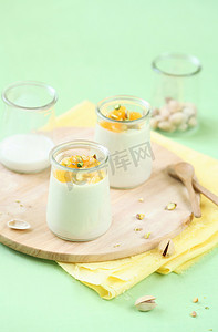 Pistachio Panna Cotta with Honey Orange Sauce