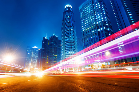 城市光速摄影照片_蓝色光速摩天大楼城市夜景