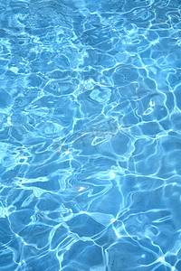 蓝色水墨海报背景摄影照片_夏天游泳池蓝色水波纹