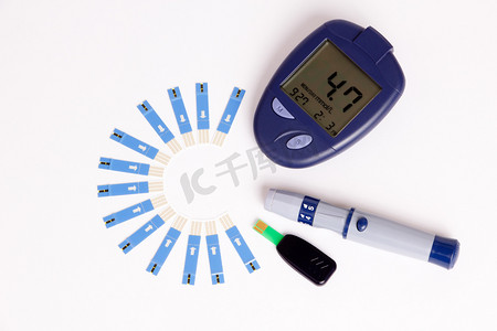重点句子摄影照片_血糖与糖尿病项血糖仪上