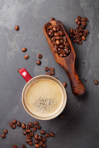 咖啡豆纹理摄影照片_咖啡杯和咖啡豆