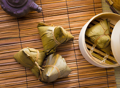 移徙摄影照片_中国饺子，期间节日场合通常采取的粽子