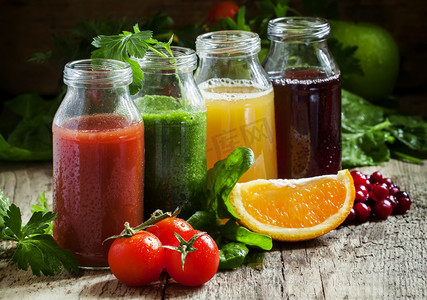 柑橘摄影照片_从水果和蔬菜的新鲜果汁瓶 