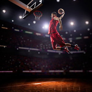 大行动摄影照片_红色的篮球运动员，在行动