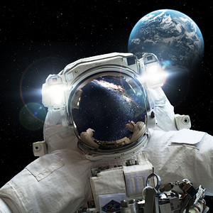 星球太空人摄影照片_宇宙星空真空宇航员