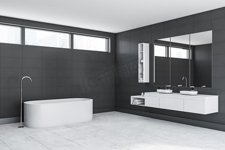 浴室风格摄影照片_时尚的灰色瓷砖浴室内部