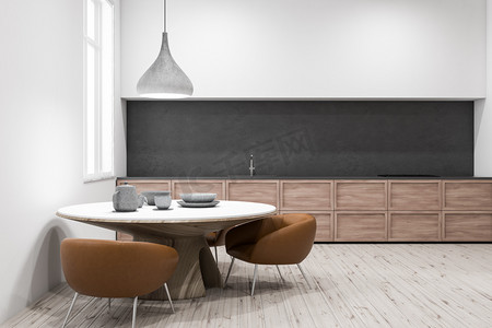 现代化的厨房, 白色的墙壁, 木地板, 灰色和木制的台面和圆桌与棕色扶手椅附近。3d 渲染