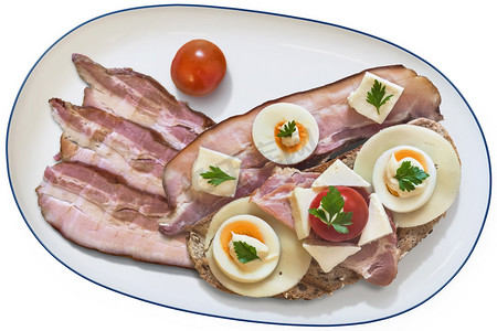 Cheese Ham Egg Sandwich with extra Bacon and Cherry Tomato on Platter Isolated on White Background