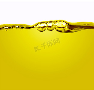 双十一海报黄色摄影照片_石油与气泡.