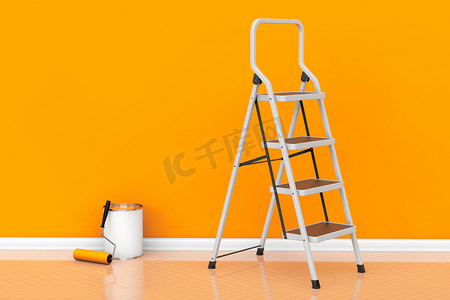 装修项目摄影照片_绘画的墙在橘黄色的概念。辊油漆罐