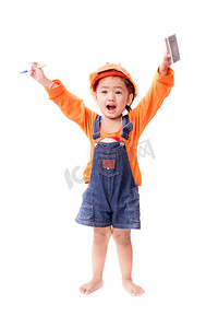 电工建筑摄影照片_亚洲工程师女婴用橡皮擦画笔和手中的钢笔