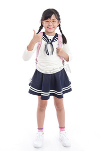 亚洲儿童在学校制服与粉红色的书包