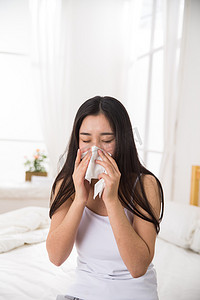 流感病毒摄影照片_青年女人生病