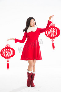红色元旦中国结摄影照片_青年女人庆祝新年