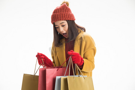 元旦新年促销摄影照片_青年女人购物