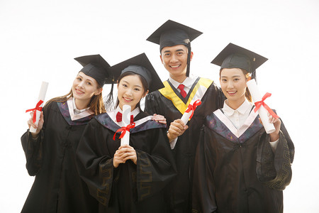 毕业展版摄影照片_大学生穿着学士服庆祝毕业