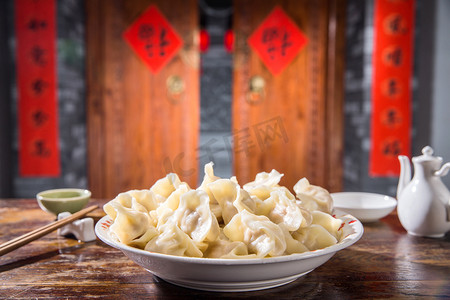 饺子摊位摄影照片_春节吃饺子