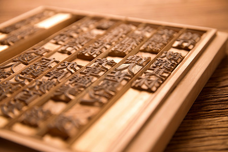古代晷面摄影图活字印刷国潮文化古代活字印刷术室内静物摆拍摄影图