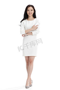 白色的裙子摄影照片_年轻商务女性