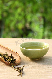 绿色茶壶摄影照片_茶杯