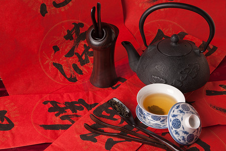 茶叶背景红色摄影照片_静物茶具
