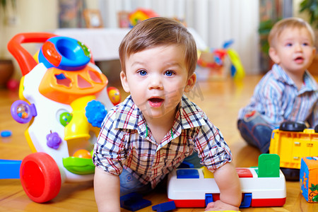 Curious boy in nursery room