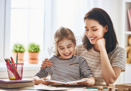 Mom and child reading a book