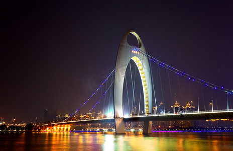 辉煌历程摄影照片_中日广州琶洲的辉煌现货光猎德大桥的夜景