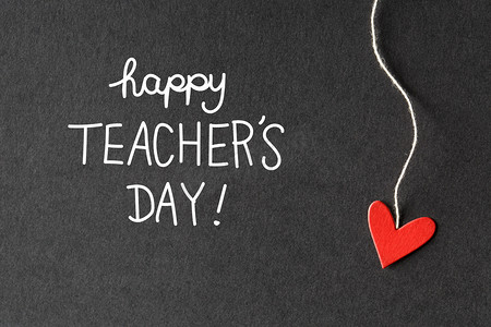 message摄影照片_Happy Teachers Day message with paper hearts 