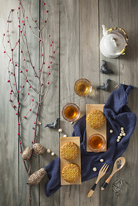 Flay lay mid autumn festival food and drink on wooden background.