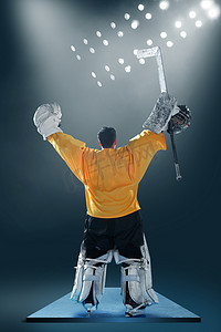 人物比赛胜利摄影照片_冰球运动员背影