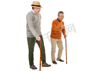 老年人摄影照片_拿着拐杖的老哥俩聊天