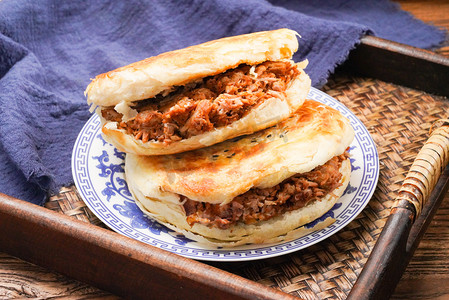 烧饼夹鸡蛋摄影图片-烧饼夹鸡蛋摄影作品-千库网