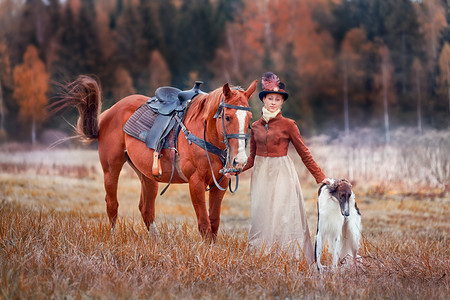 大衣首页摄影照片_夫人在骑在马打猎的习惯