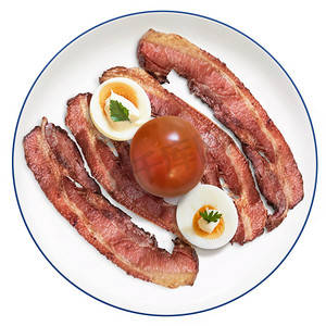 Fried Bacon Rashers with Tomato hard boiled Egg slices with Mayonnaise on Porcelain Plate Isolated on White Background
