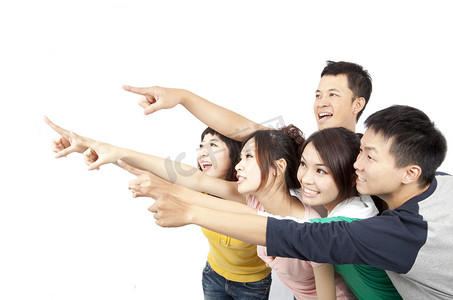 开心的学生们摄影照片_快乐亚洲年轻组指向离开隔离在白色背景上