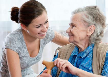 nursing摄影照片_Nursing lady at home