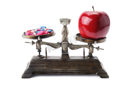 体重秤、 苹果和药丸的碗